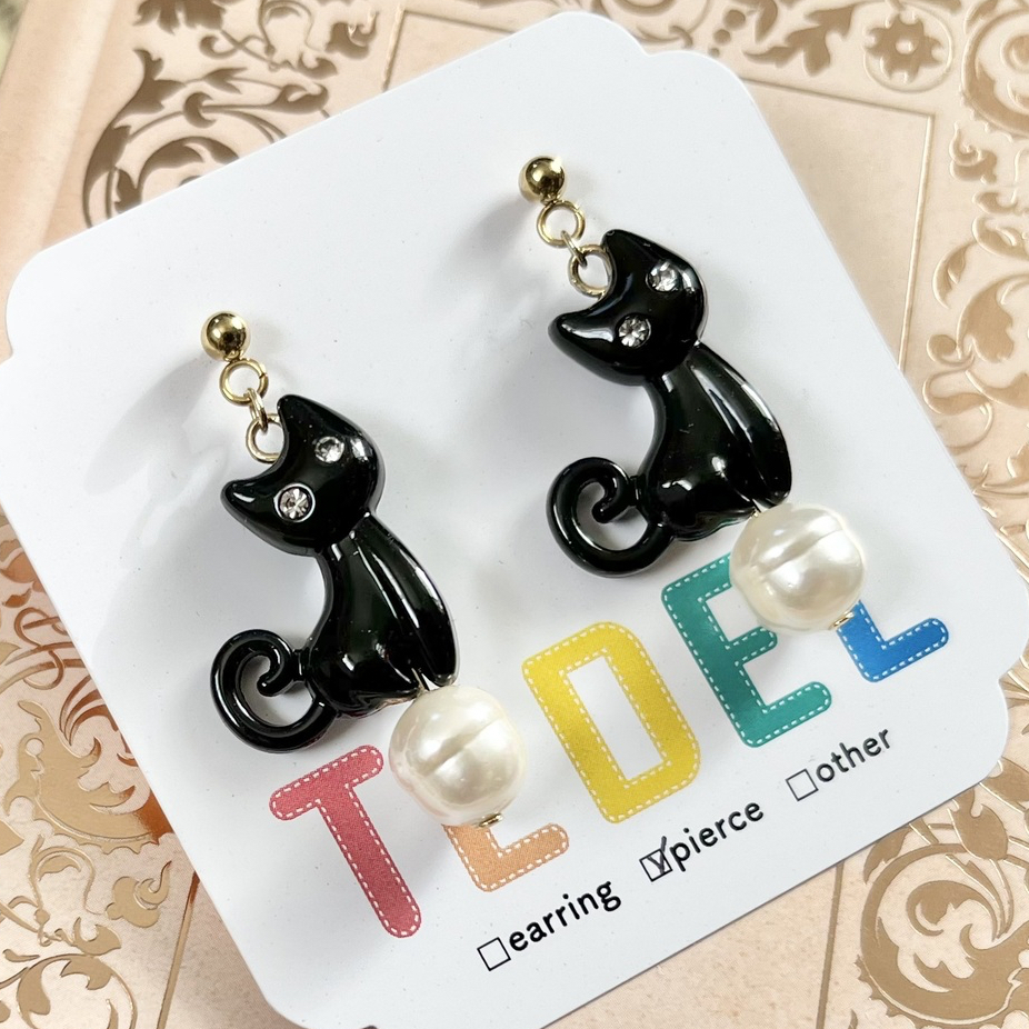 黒猫とヴィンテージパール